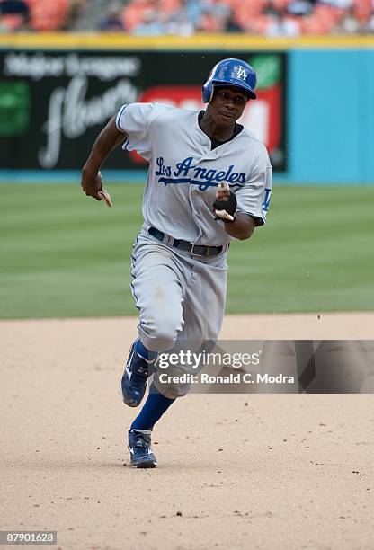 Juan Pierre of the Los Angeles Dodgers runs to third base during a game against the Florida Marlins at Dolphin Stadium on May 17, 2009 in Miami,...