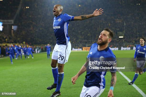 Naldo of Schalke celebrates after he scored a goal to make it 4:4 with Guido Burgstaller of Schalke during the Bundesliga match between Borussia...