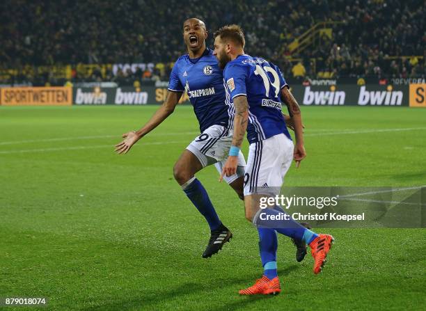 Naldo of Schalke celebrates after he scored a goal to make it 4:4 with Guido Burgstaller of Schalke during the Bundesliga match between Borussia...