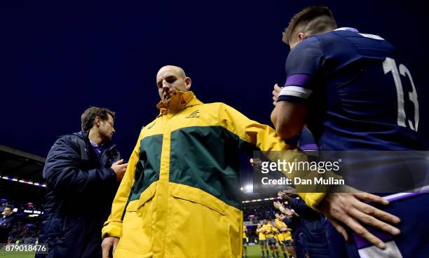 Stephen Moore of Australia walks through a guard of honor after the international match between Scotland and Australia at Murrayfield Stadium on...
