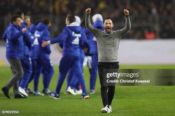Coach Domenico Tedesco of Schalke celebrates after the Bundesliga match between Borussia Dortmund and FC Schalke 04 at Signal Iduna Park on November...