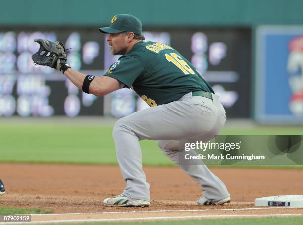 Jason Giambi of the Oakland Athletics fields against the Detroit Tigers during the game at Comerica Park on May 16, 2009 in Detroit, Michigan. The...