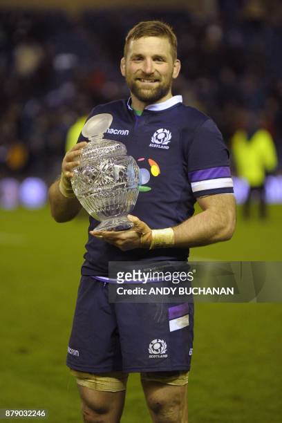 Scotland's flanker John Barclay poses with the Hopetoun Cup after the autumn international rugby union test match between Scotland and Australia at...