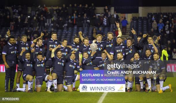 Scotland's players pose with the Hopetoun Cup after the autumn international rugby union test match between Scotland and Australia at Murrayfield...