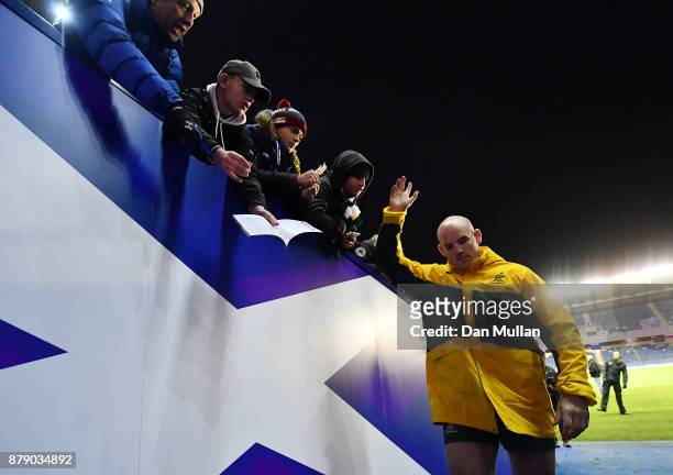 Stephen Moore of Australia waves goodbye as he makes his way down the tunnel following his final test match, the International match between Scotland...