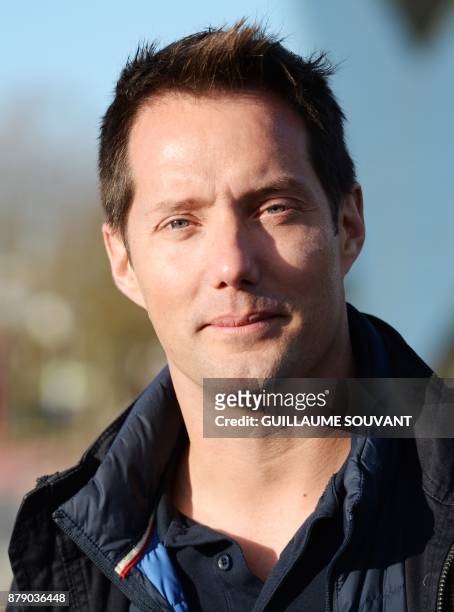 French astronaut Thomas Pesquet poses on November 25, 2017 in front of the Kinemax at the Futuroscope theme park in Chasseneuil-du-Poitou, Western...