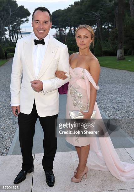 David Furnish and actress Hayden Panettiere attend the amfAR Cinema Against AIDS 2009 Cocktail Party at the Hotel du Cap during the 62nd Annual...