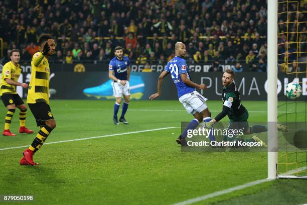 Raphael Guerreiro of Dortmund scores a goal to make it 4:0 during the Bundesliga match between Borussia Dortmund and FC Schalke 04 at Signal Iduna...