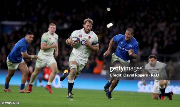 Chris Robshaw of England runs with the ball during the Old Mutual Wealth Series match between England and Samoa at Twickenham Stadium on November 25,...