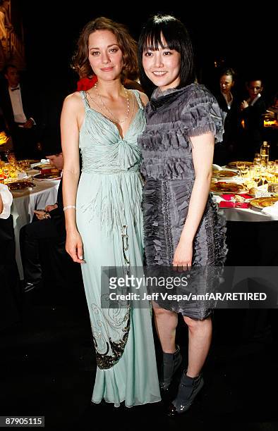 Actresses Marion Cotillard and Rinko Kikouchi during the amfAR Cinema Against AIDS 2009 benefit at the Hotel du Cap during the 62nd Annual Cannes...