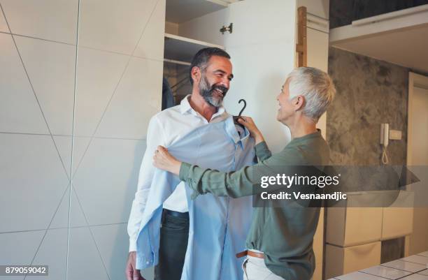 preparing for work - old wardrobe stock pictures, royalty-free photos & images