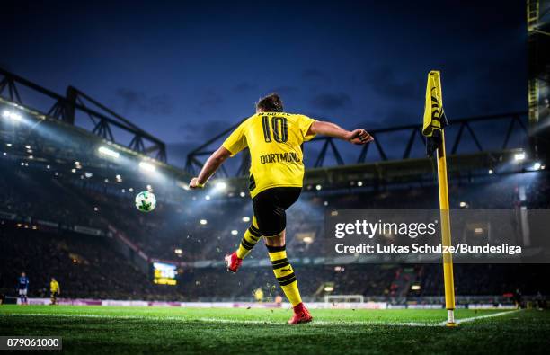 Mario Goetze of Dortmund kick a corner during the Bundesliga match between Borussia Dortmund and FC Schalke 04 at Signal Iduna Park on November 25,...