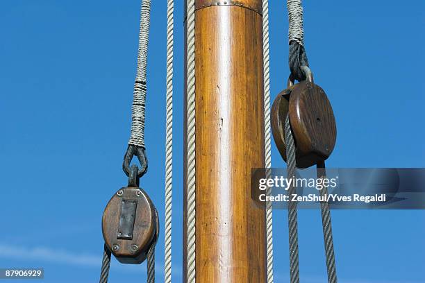 boat mast and pulleys, close-up - boat mast stock pictures, royalty-free photos & images