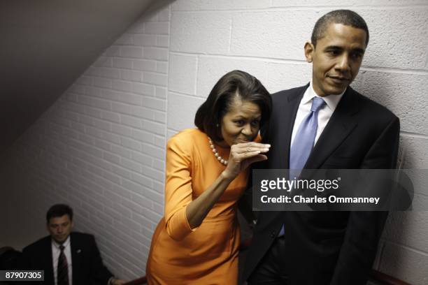 Democratic presidential hopeful Sen. Barack Obama and his wife Michelle Obama backstage before speaking during a rally at the North Carolina State...