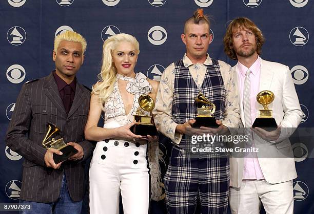 Tony Kanal, Gwen Stefani, Adrian Young and Tom Dumont of No Doubt, winner for Best Pop Performance By A Duo Or Group With Vocal, pose during the 46th...