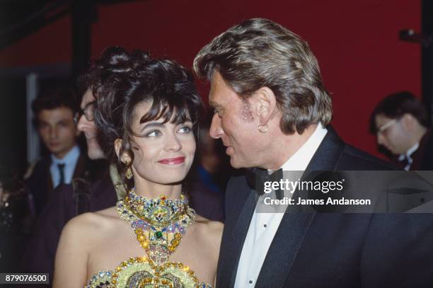 Paris, French singer Johnny Hallyday and his wife Adeline at 6th ceremony of "Victoires de la musique", 03nd February 1991