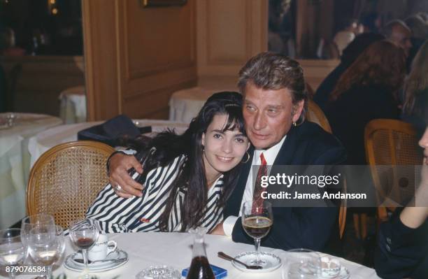 Paris, Reunion of the french singer Johnny Hallyday and Adeline during a dinner at Fouquet's for the first of the movie "La gamine" in which Johnny...