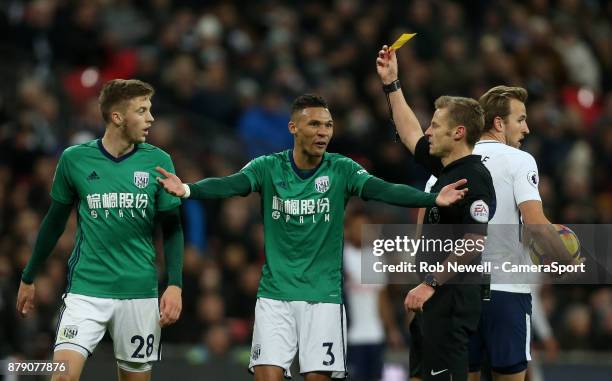 West Bromwich Albion's Kieran Gibbs protests as Sam Field receives a yellow card from referee Michael Jones during the Premier League match between...