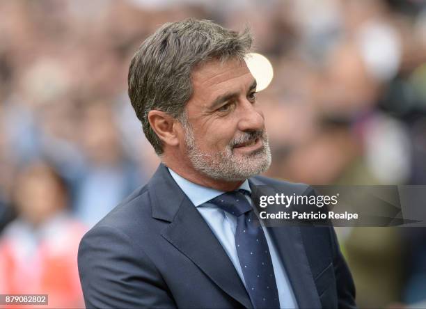 Michel Gonzalez coach of Malaga smiles during a match between Real Madrid and Malaga as part of La Liga at Santiago Bernabeu Stadium on November 25,...