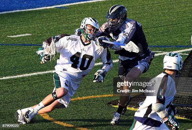 Ronnie Staines of the Washington Bayhawks defends against Matt Danowski of the Long Island Lizards during their Major League Lacrosse game at Shuart...