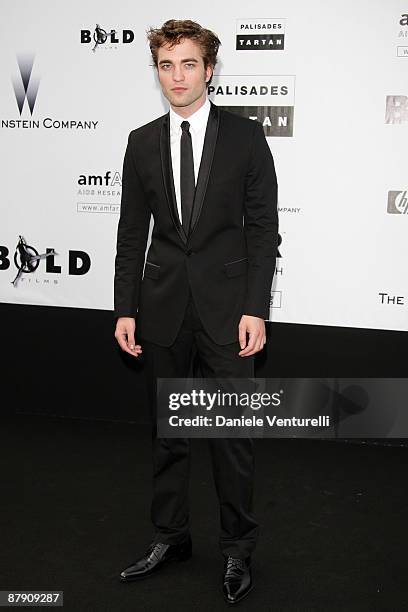 Actor Robert Pattinson attends the amfAR Cinema Against AIDS 2009 benefit at the Hotel du Cap during the 62nd Annual Cannes Film Festival on May 21,...