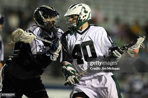 Matt Danowski of the Long Island Lizards controls the ball against Benson Erwin of the Washington Bayhawks during their Major League Lacrosse game at...