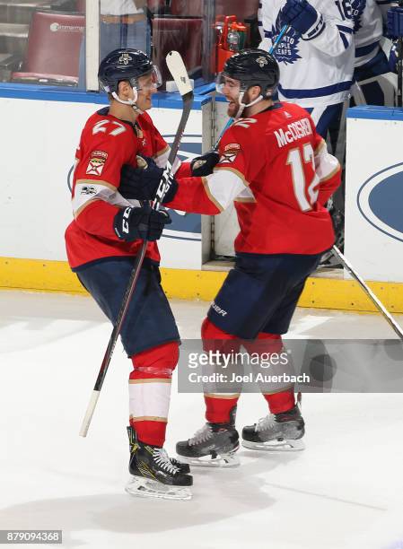 Nick Bjugstad celebrates his game winning goal with Ian McCoshen of the Florida Panthers in the shootout period against the Toronto Maple Leafs at...