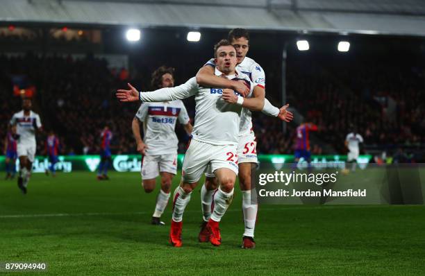 Xherdan Shaqiri of Stoke City celebrates scoring his sides first goal with Ramadan Sobhi of Stoke City during the Premier League match between...