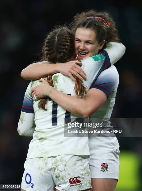 Jess Breach of England celebrates scoring her fourth try with a team mate during the Old Mutual Wealth Series match between England and Canada at...