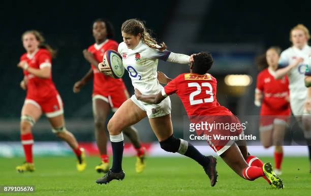 Jess Breach of England on the way to scoring a try during the Old Mutual Wealth Series match between England and Canada at Twickenham Stadium on...