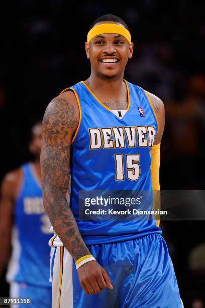 Carmelo Anthony of the Denver Nuggets smiles in the fourth quarter while taking on the Los Angeles Lakers in Game Two of the Western Conference...