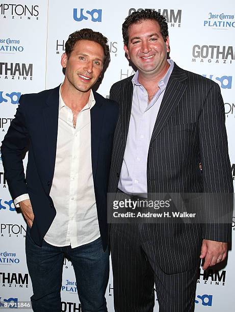 Actor Mark Feuerstein and Executive Producer Paul Frank attend Hamptons and Gotham Magazine's summer celebration with the cast of "Royal Pains" at...