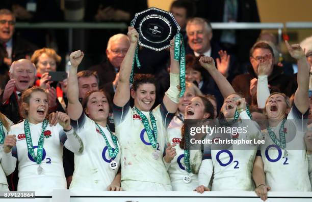 Sarah Hunter of England lifts the trophy after victory after the Old Mutual Wealth Series match between England and Canada at Twickenham Stadium on...