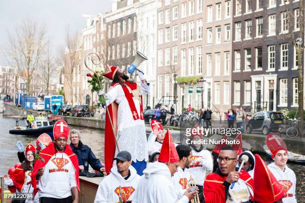November 25th, Amsterdam. Patrick Mathurin, who play this year again the new St. Nicholas arrived on his boat with his helpers to start the party and...