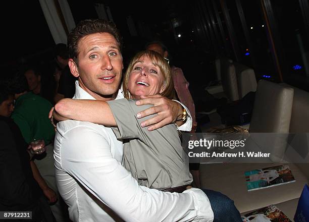 Actor Mark Feuerstein and NBC Universal Cable Entertainment President Bonnie Hammer attend Hamptons and Gotham Magazine's summer celebration with the...