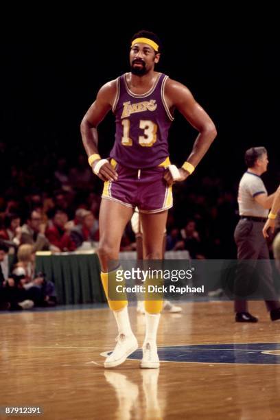 Wilt Chamberlain of the Los Angeles Lakers walks the court during a game played against Milwaukee Bucks in 1972 at the Mecca in Milwaukee, Wisconsin....