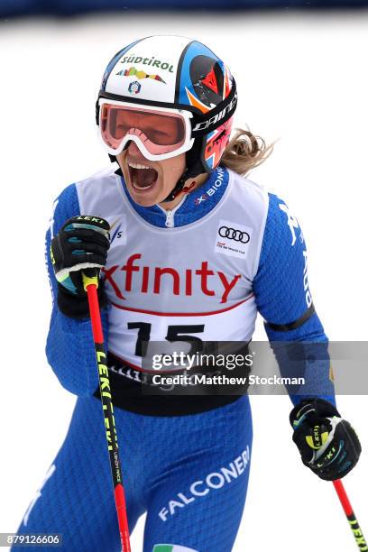 Manuela Moelgg of Italy celebrates after her second run to place third in the Giant Slalom during the Audi FIS Ski World Cup - Killington Cup on...