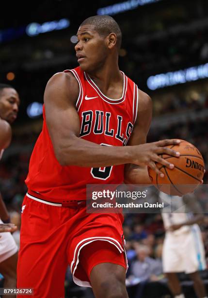 Cristiano Felicio of the Chicago Bulls rebounds against the Charlotte Hornets at the United Center on November 17, 2017 in Chicago, Illinois. The...