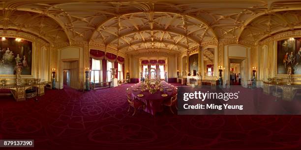 Table in the State Dining Room, set with silver-gilt pieces from the Grand Service, commissioned by George IV and still used today by The Queen and...