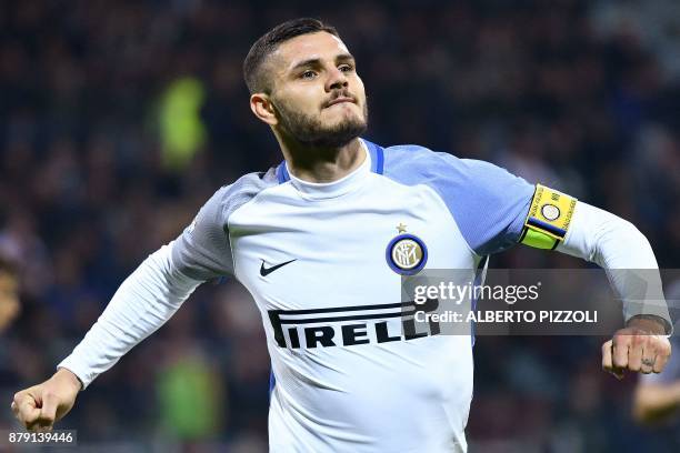 Inter Milan's Argentinian forward Mauro Icardi celebrates after scoring a goal during the Italian Serie A football match between Cagliari and Inter...