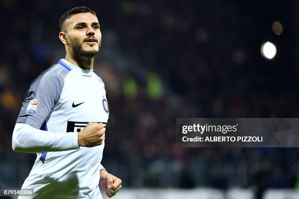 Inter Milan's Argentinian forward Mauro Icardi celebrates after scoring a goal during the Italian Serie A football match between Cagliari and Inter...