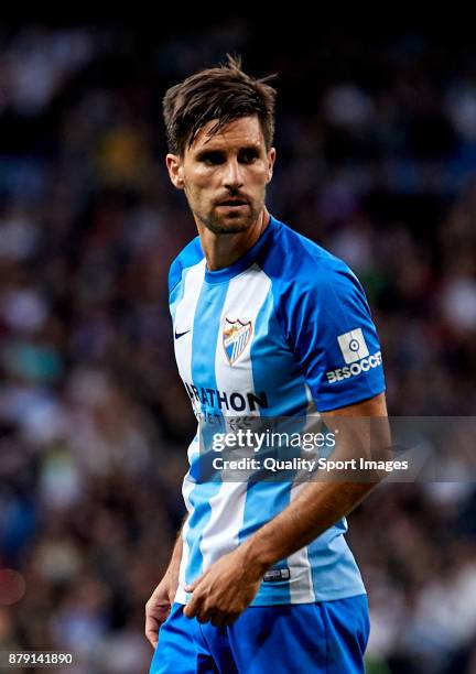 Adrian Gonzalez of Malaga CF looks on during the La Liga match between Real Madrid and Malaga at Estadio Santiago Bernabeu on November 25, 2017 in...