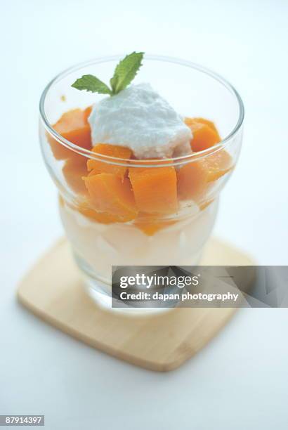 mango with coconut gel - beer mat stock pictures, royalty-free photos & images