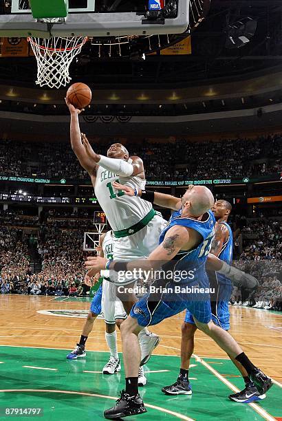 Glen Davis of the Boston Celtics shoots a layup against Marcin Gortat of the Orlando Magic in Game Five of the Eastern Conference Semifinals during...