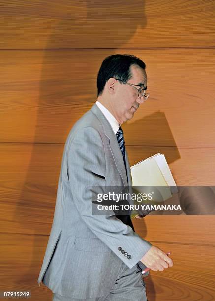 Bank of Japan governor Masaaki Shirakawa leaves a press conference at the headquarters in Tokyo on May 22, 2009. The Japanese central bank chief said...