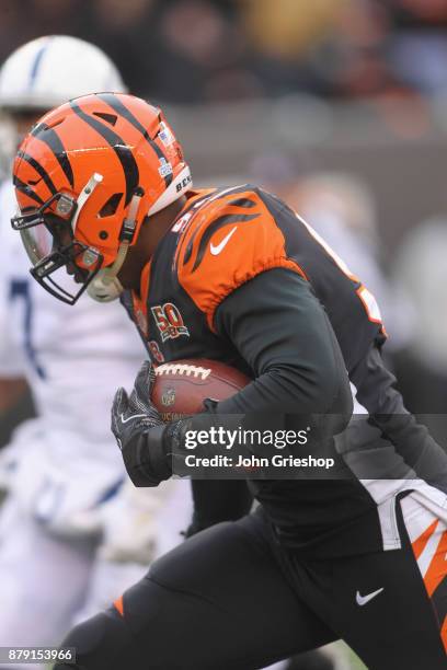 Carlos Dunlap of the Cincinnati Bengals runs the football into the endzone during the game against the Indianapolis Colts at Paul Brown Stadium on...