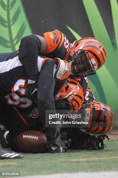 Carlos Dunlap and Vontaze Burfict of the Cincinnati Bengals celebrate a touchdown during the game against the Indianapolis Colts at Paul Brown...