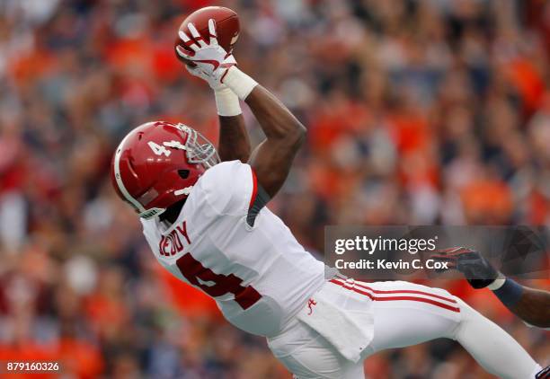 Jerry Jeudy of the Alabama Crimson Tide catches a touchdown pass during the second quarter against the Auburn Tigers at Jordan Hare Stadium on...