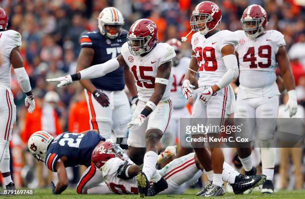 Ronnie Harrison of the Alabama Crimson Tide celebrates after a tackle during the second quarter against the Auburn Tigers at Jordan Hare Stadium on...