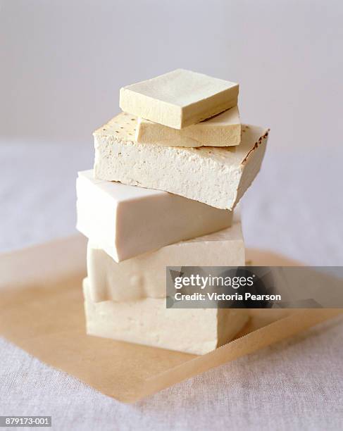 blocks of tofu arranged in stack - tofu stock pictures, royalty-free photos & images